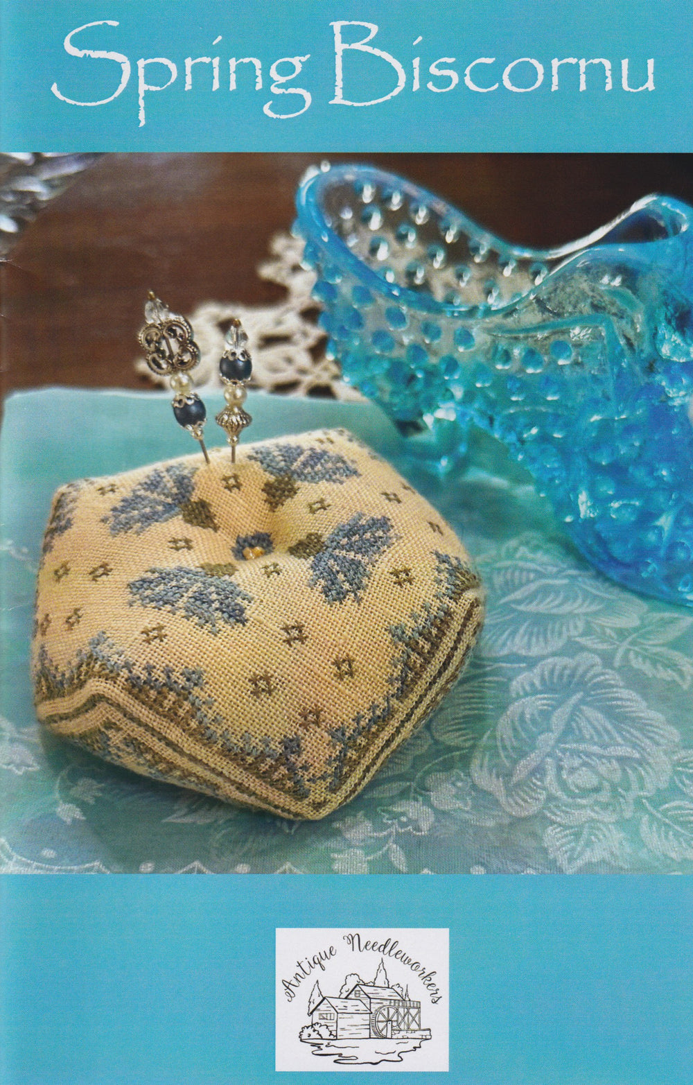 Spring Biscornu by Antique Needleworkers