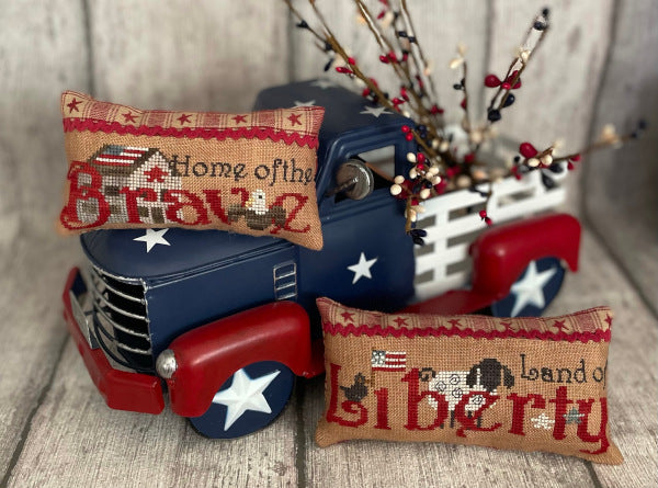 Brave & Liberty Pillows by Mani di Donna